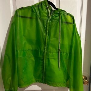 This product is a green rain coat from elodie in the side M in women’s